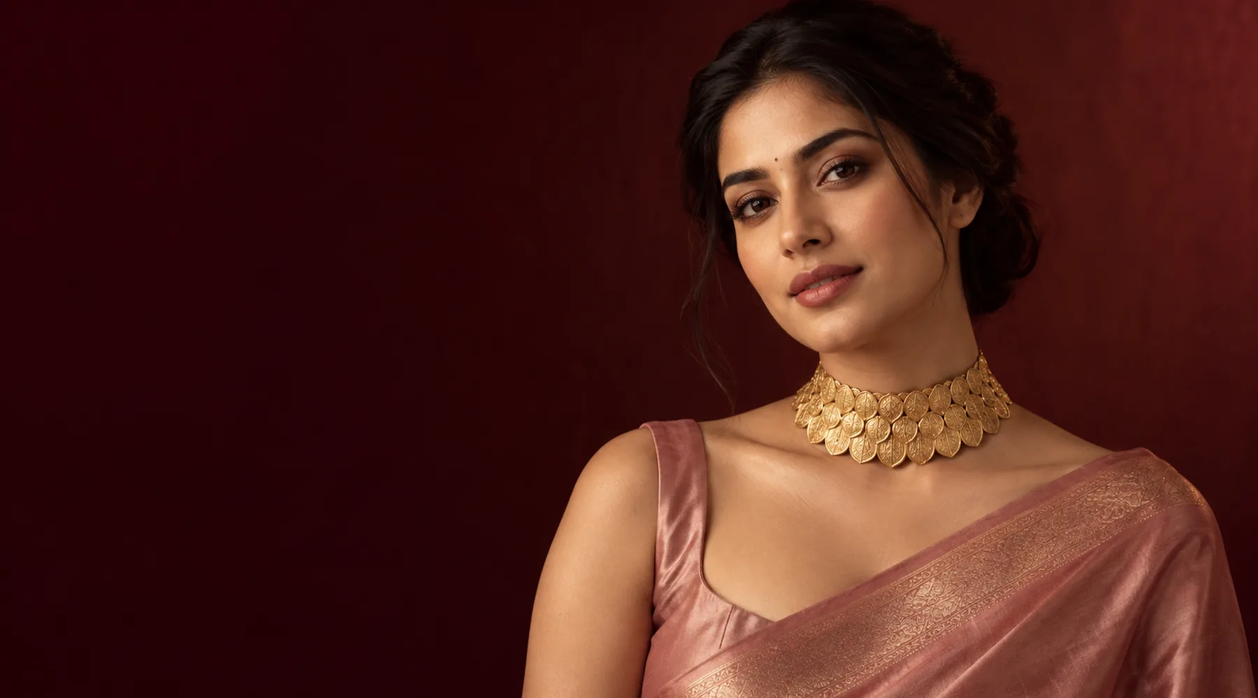 A woman wearing a wide gold choker of overlapping petal shapes